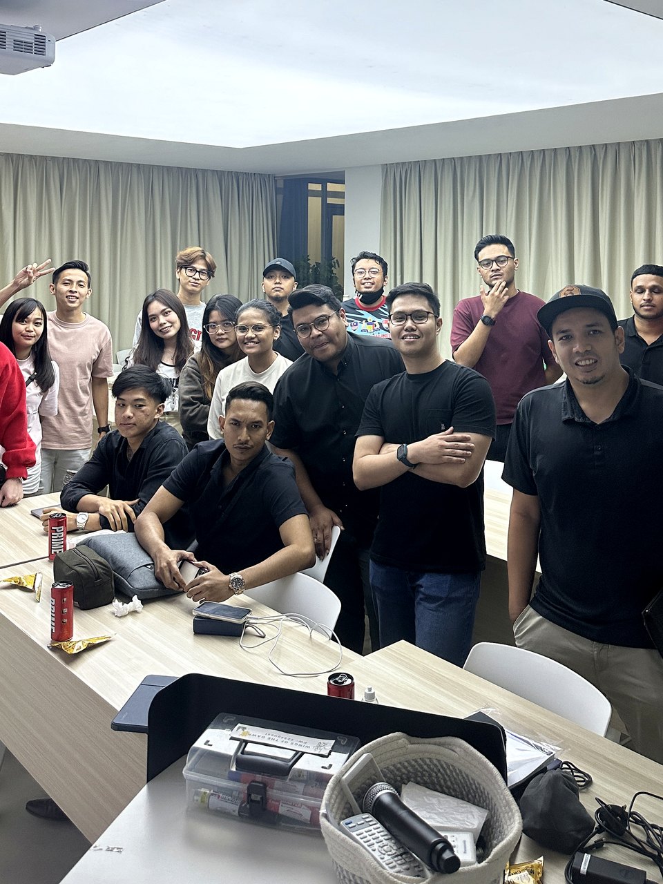 PounderFX group refresher students gathered together in a classroom setting.